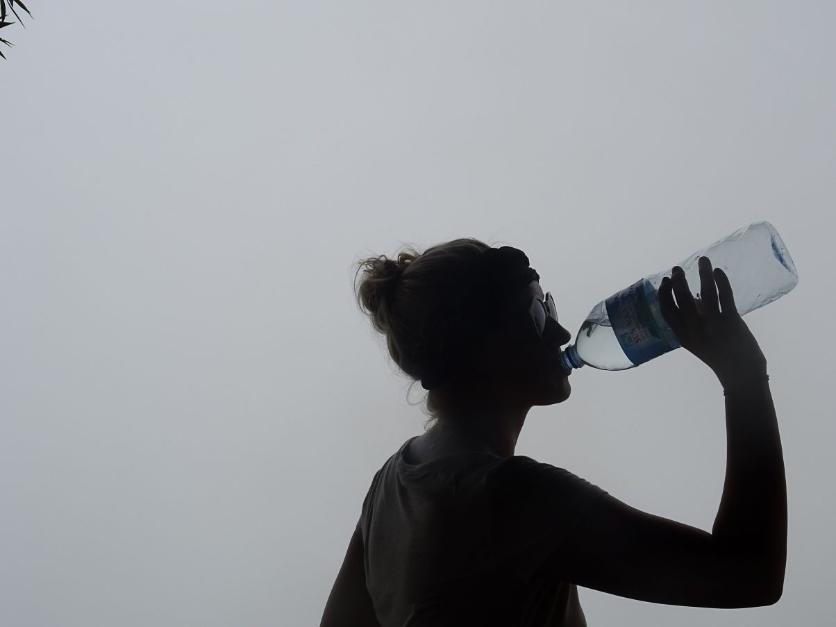 Girl drinking in clouds