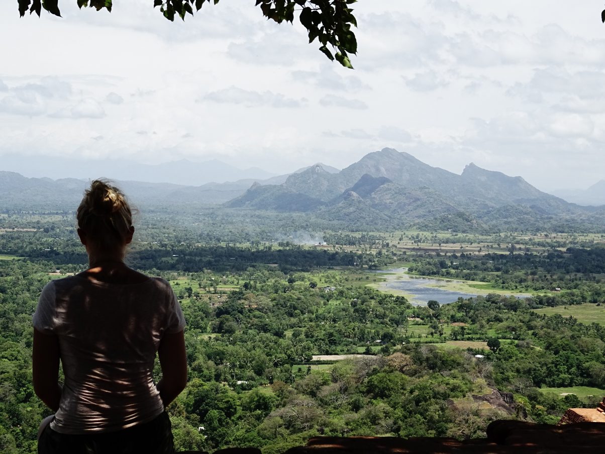 Girl overlooking mountain view
