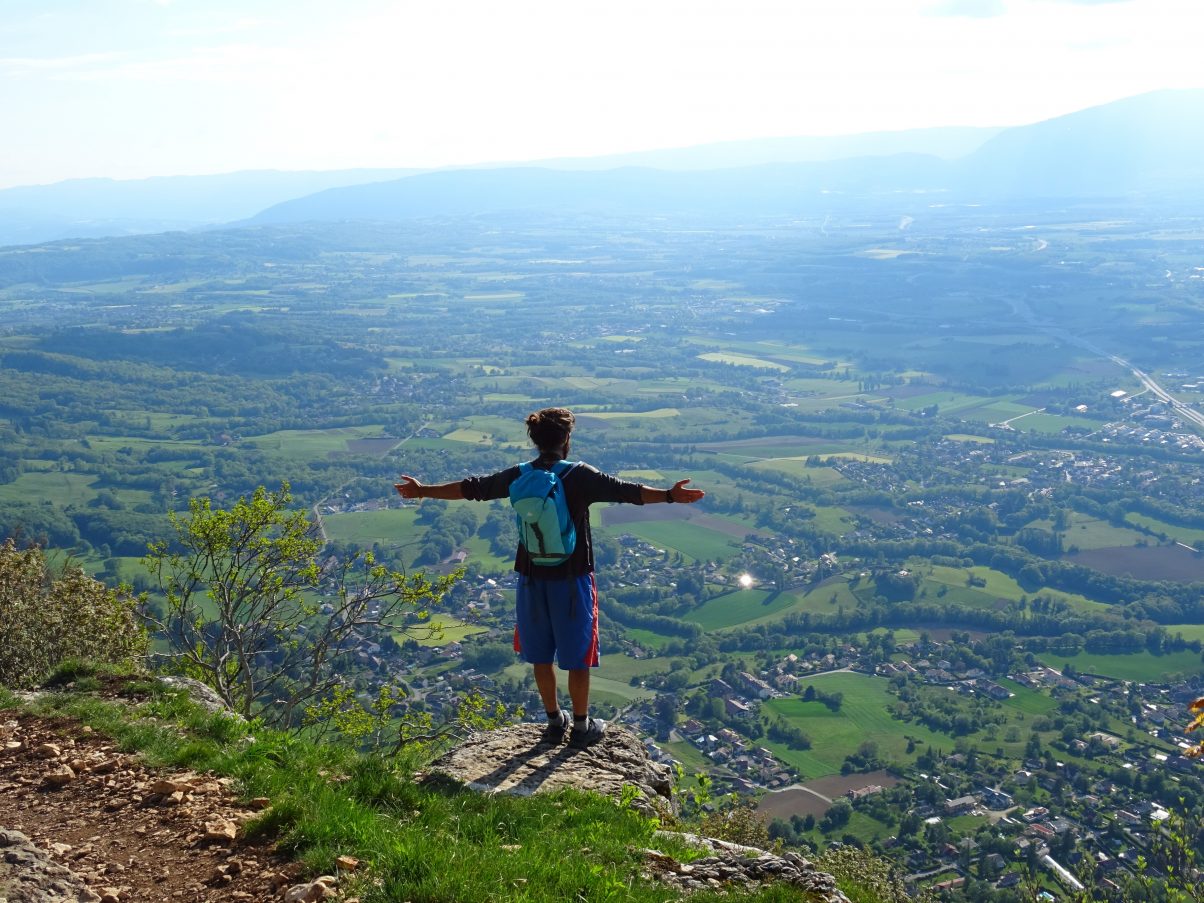 Man standing on the edge of a cliff