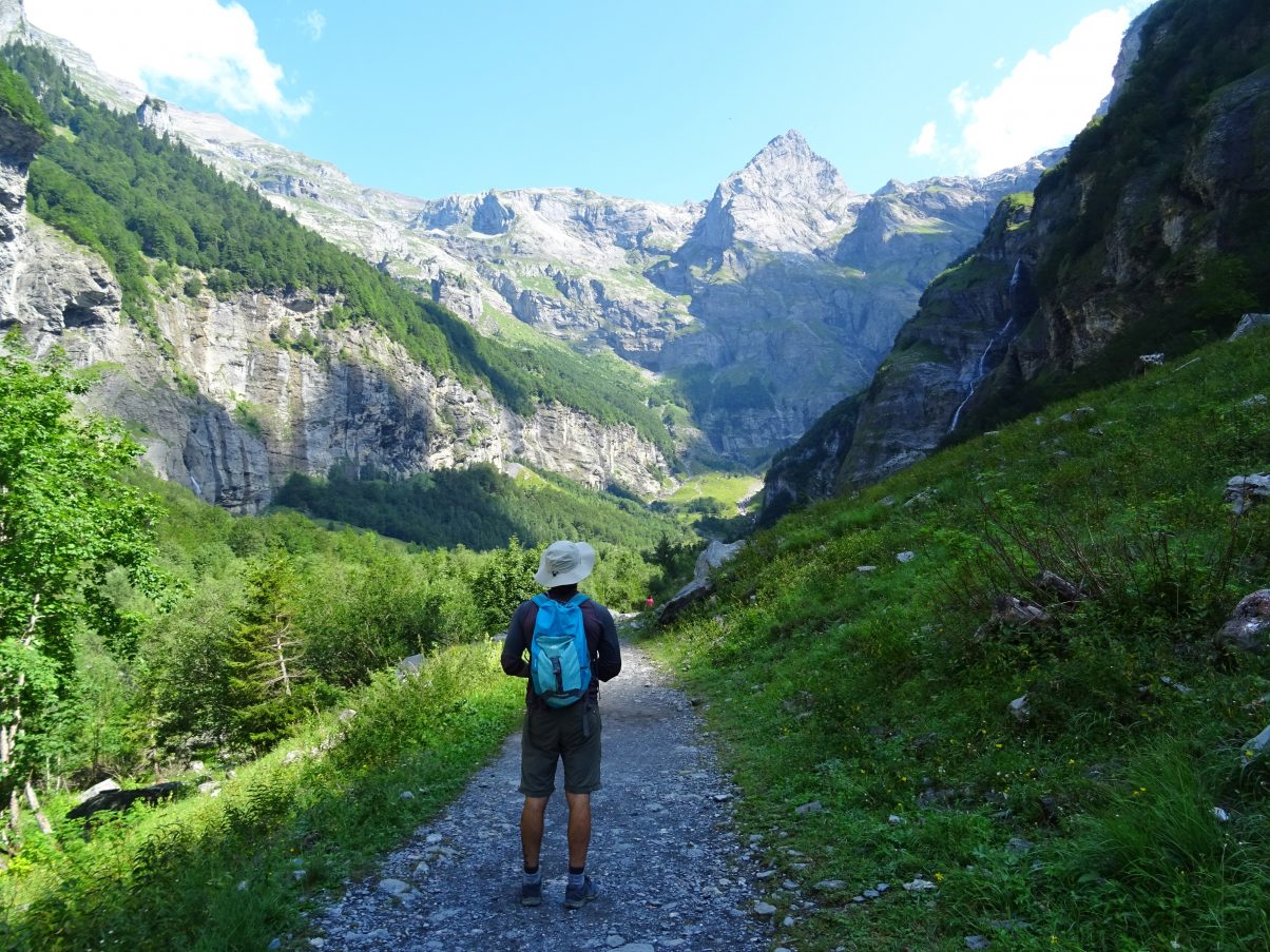 Man hiking in Sixt fer a Cheval in the French Alps