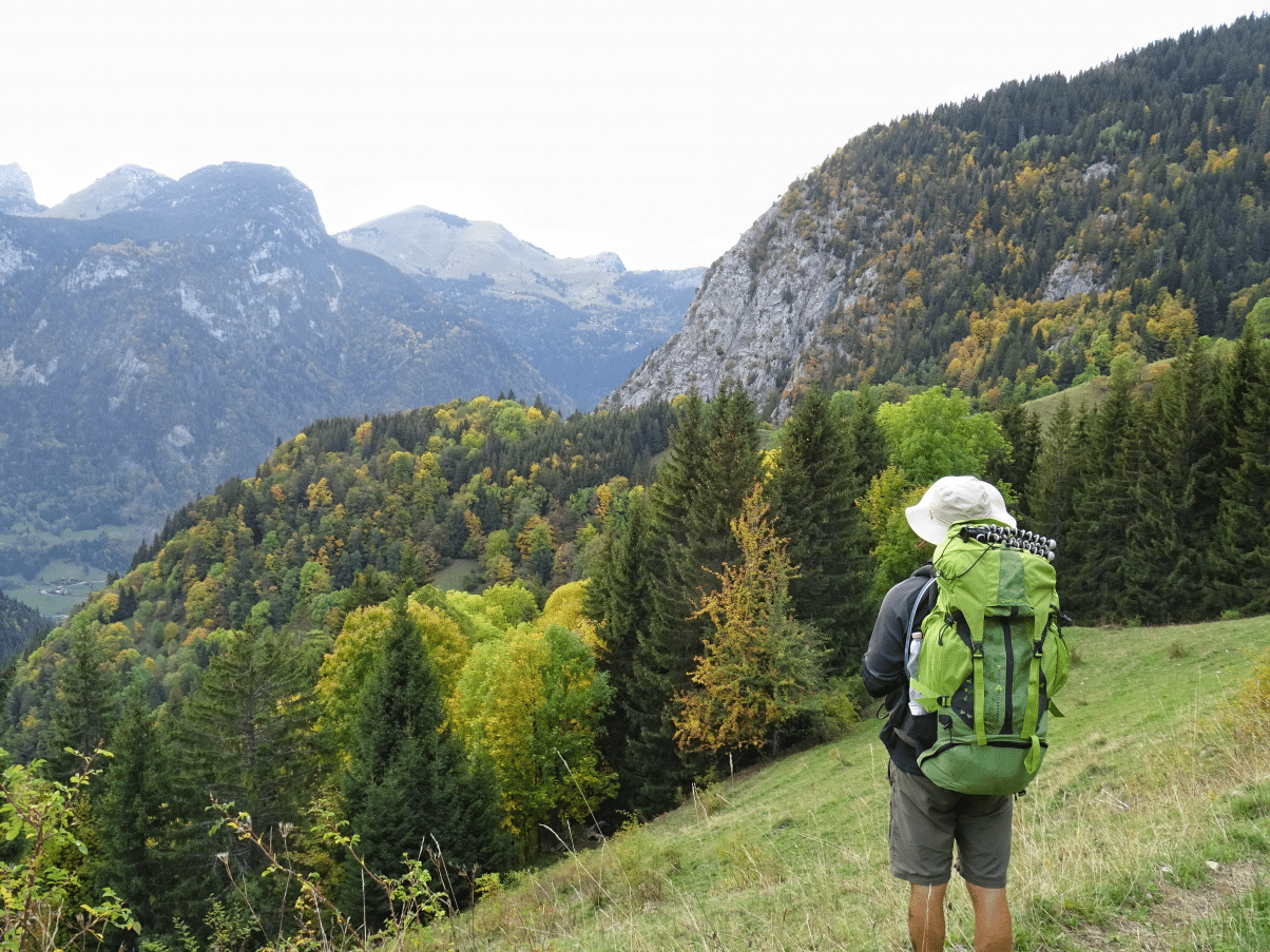 Man hiking with big rucksack in the mountains