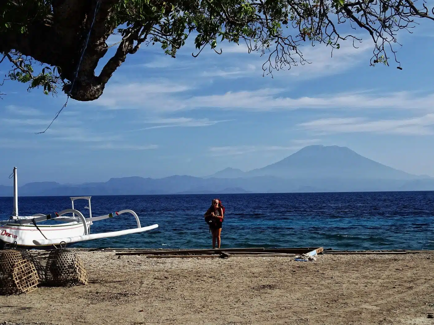 Girl backpacking on tropical island