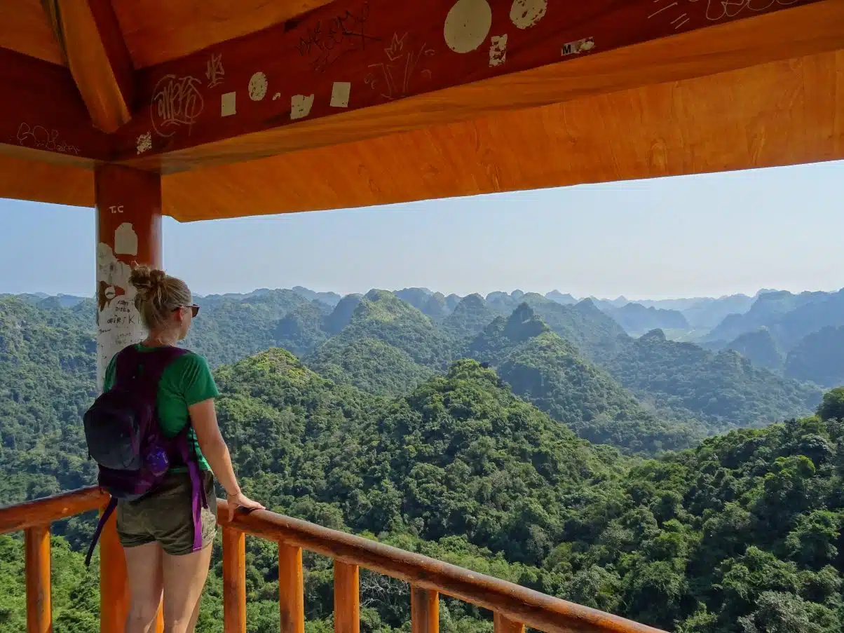 Girl overlooking mountains Cat Ba National Park