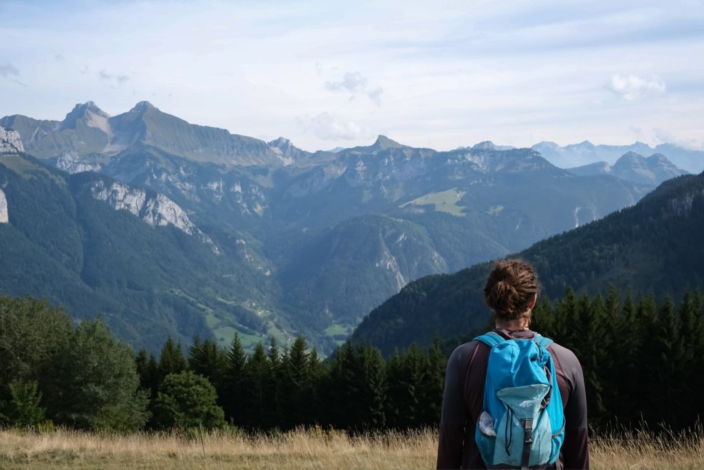 Man on a hiking trail in the French Alps