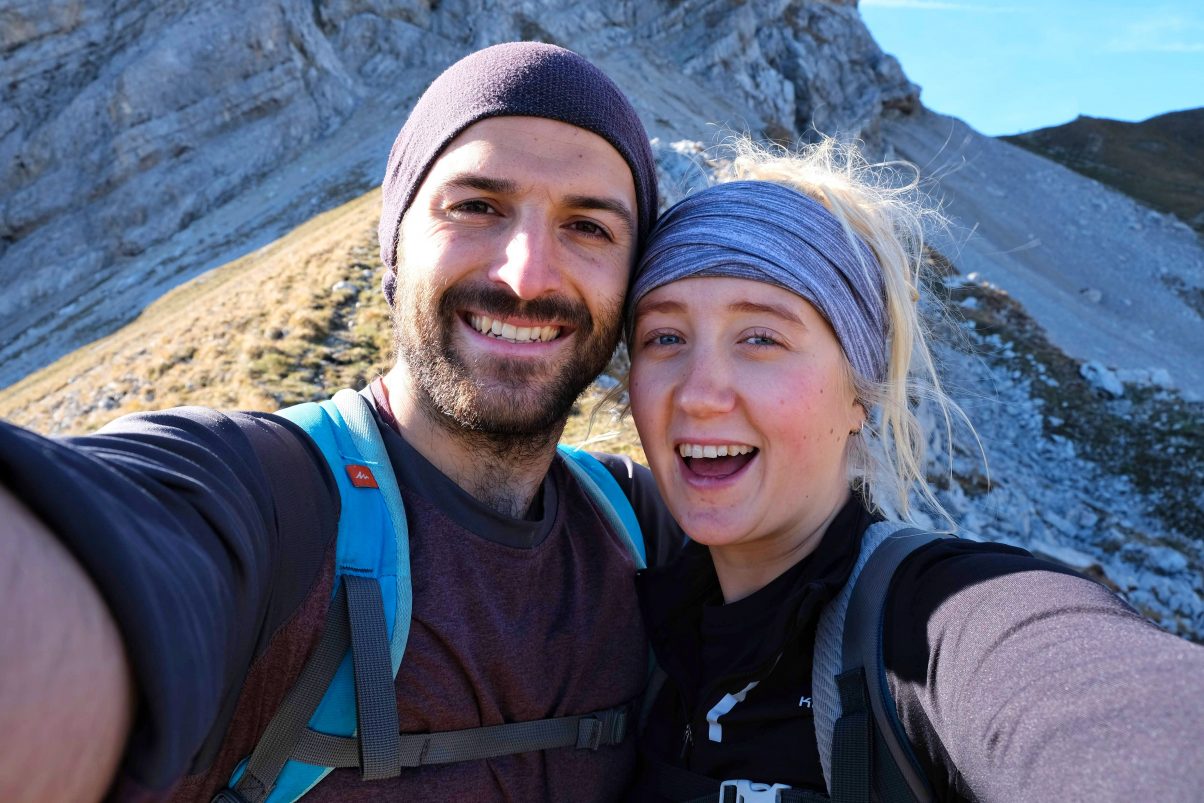 Couple Wearing hiking clothes on mountain