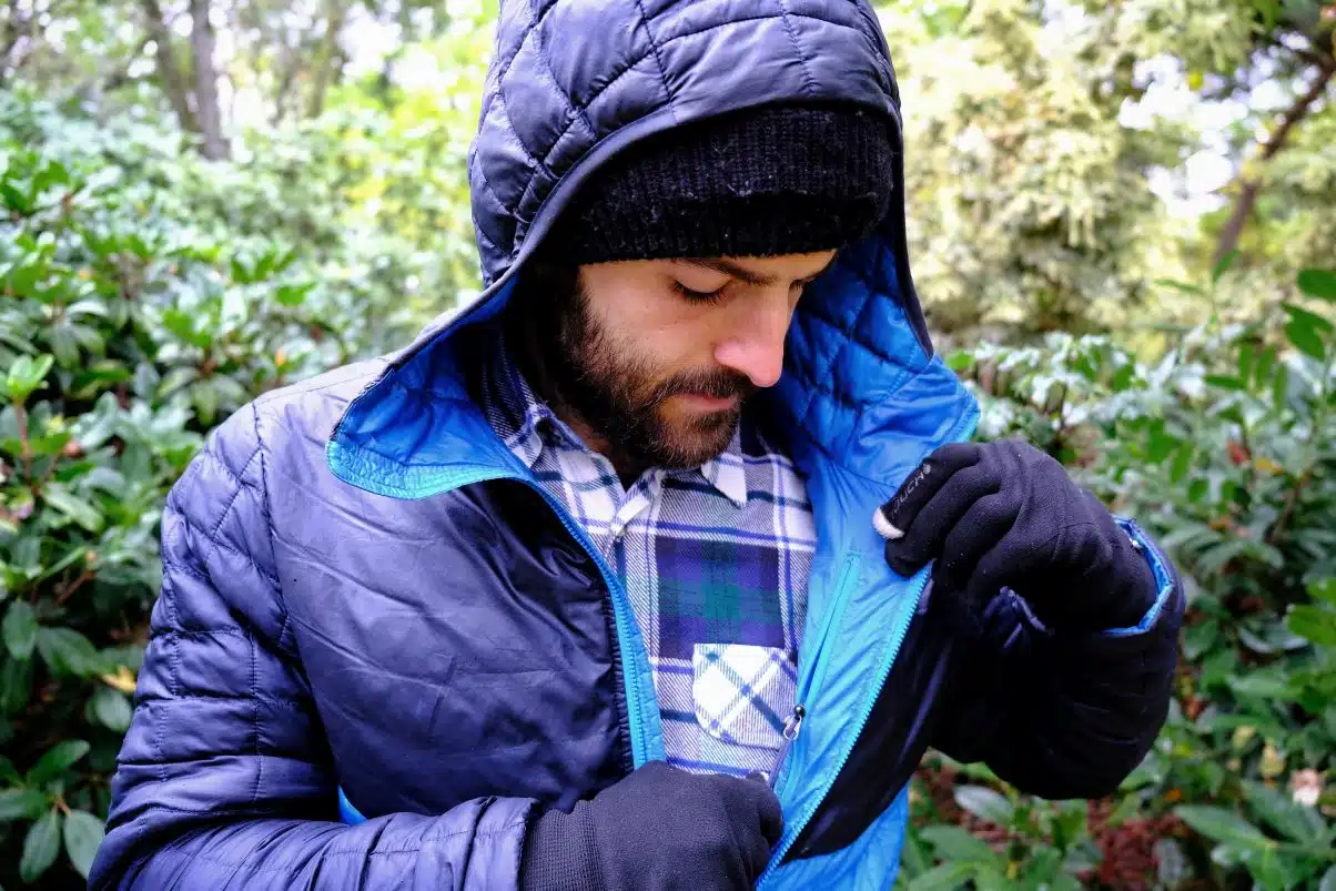 Showing the inner pocket on a North Face Thermoball coat