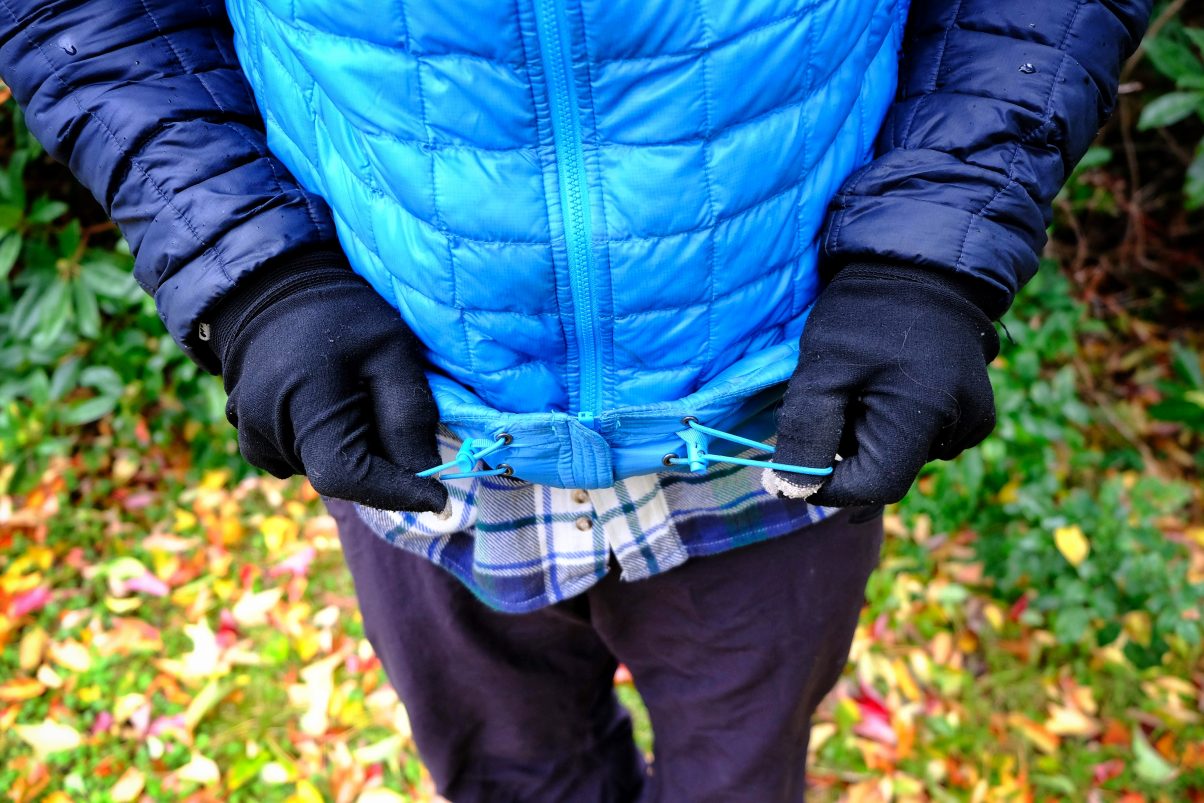 The cinch cords on a Thermoball hoodie