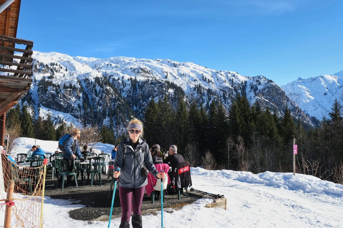 Girl hiking in French Alps at mountain chalet 