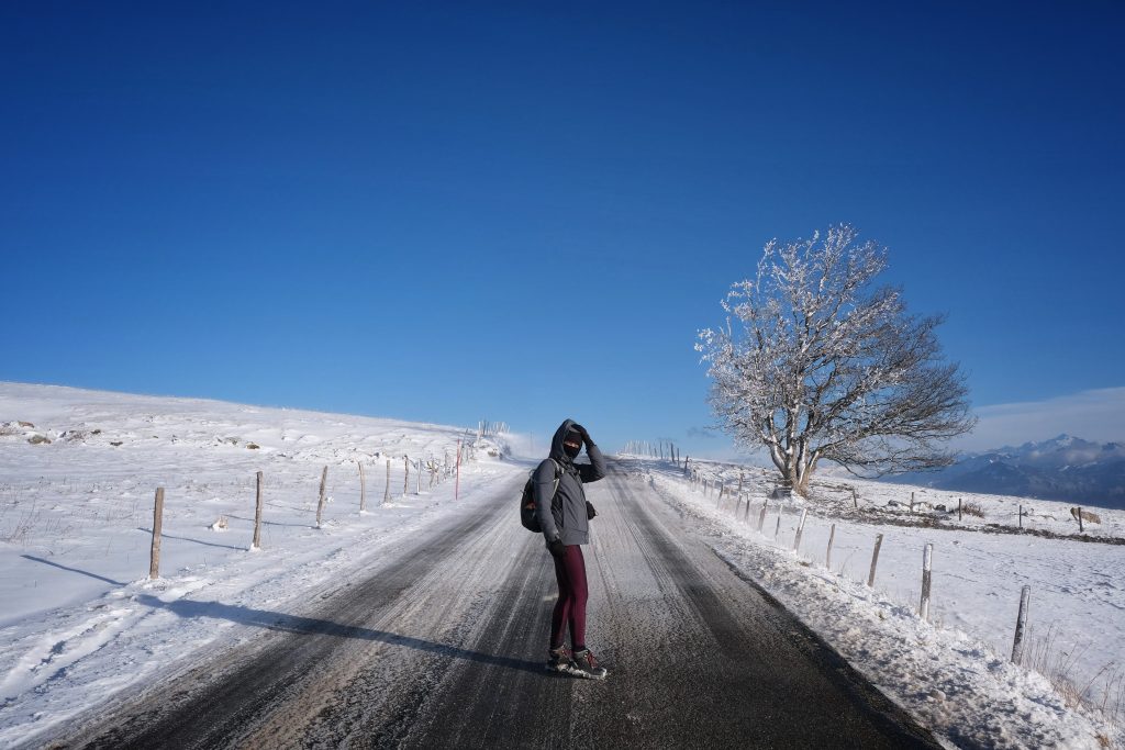 Woman hiking in the snow