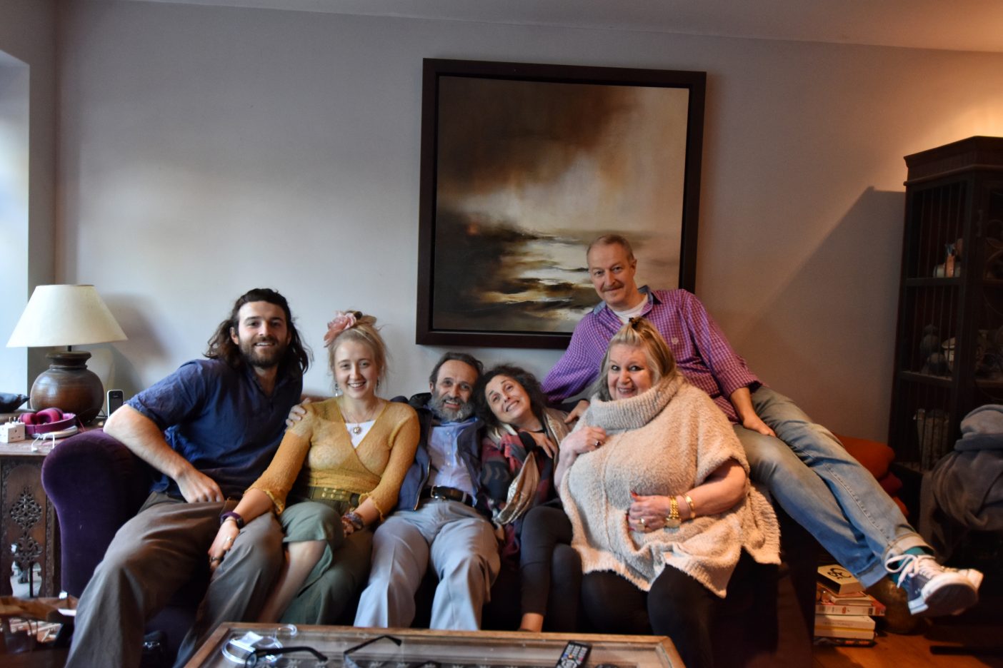 Family sitting on the sofa