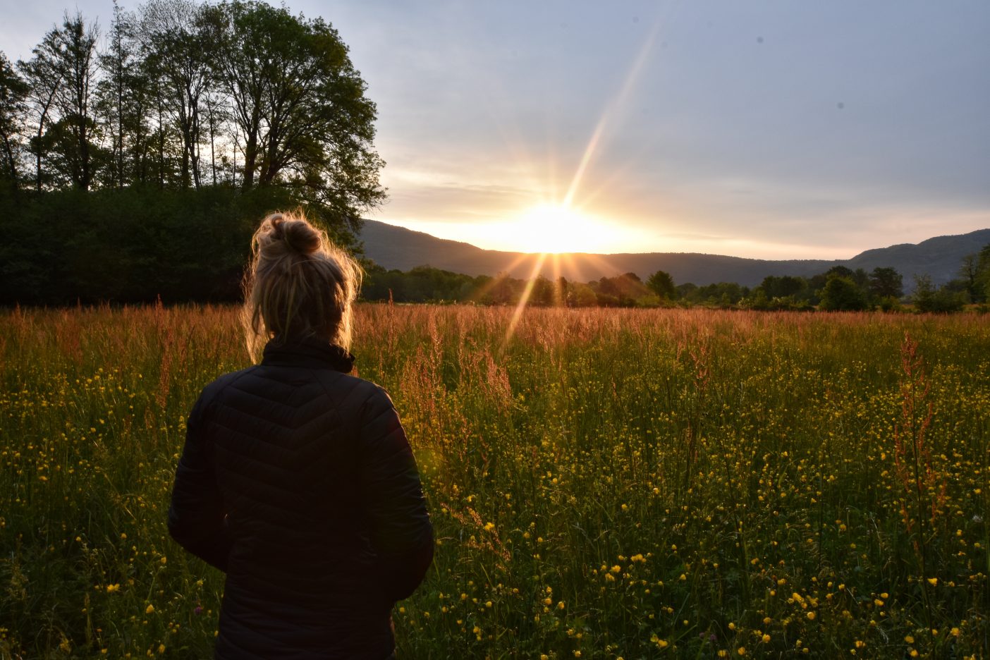 Girl camping in beautiful nature