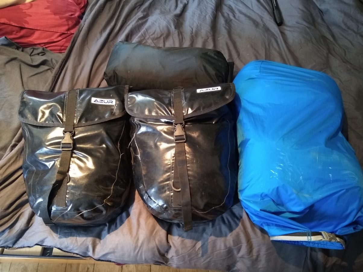 Cycle panniers filled with gear