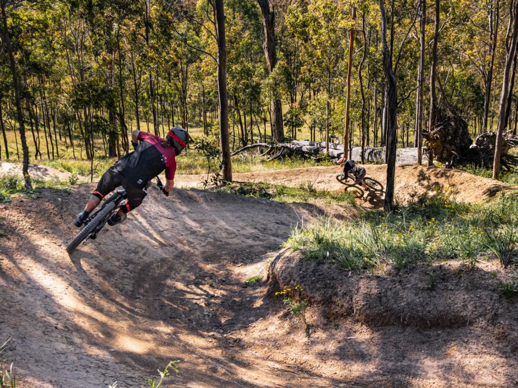 Male mountain biker on dirt track
