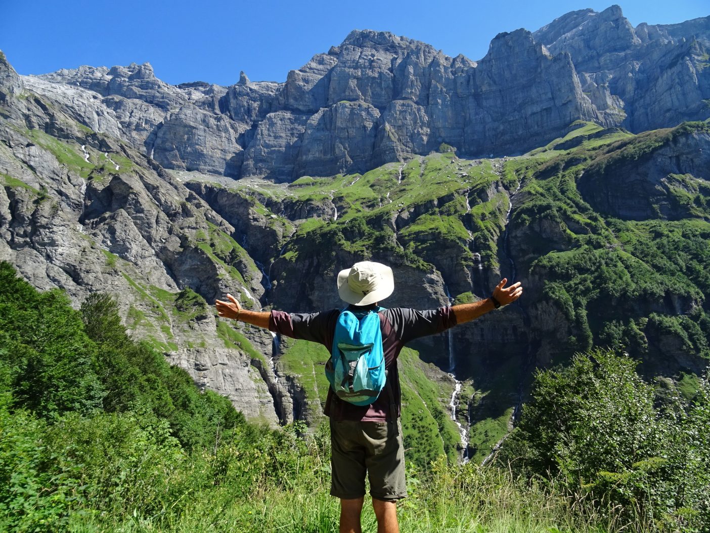 Man standing in front of mountain 