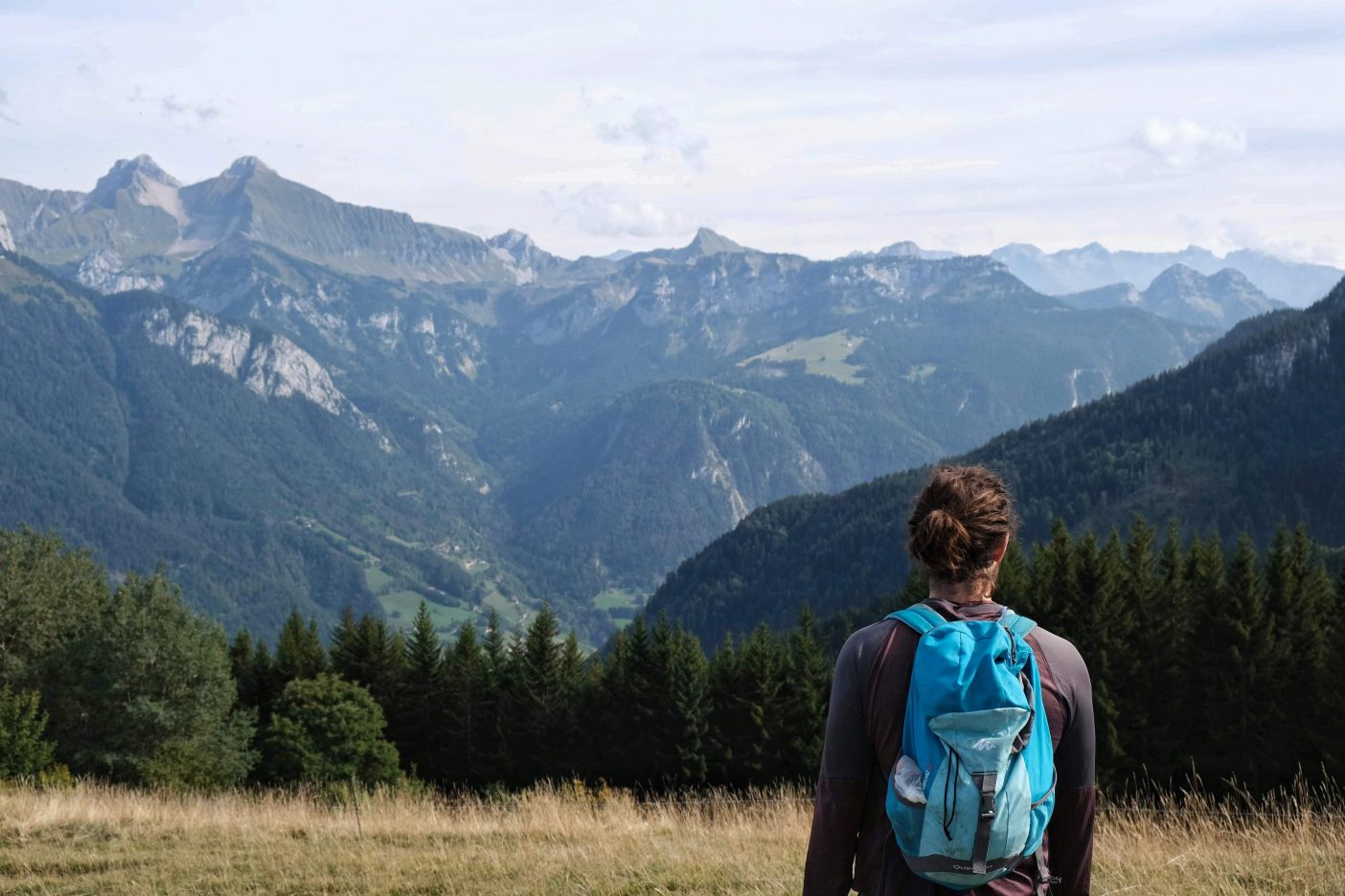 Man in front of mountain view 
