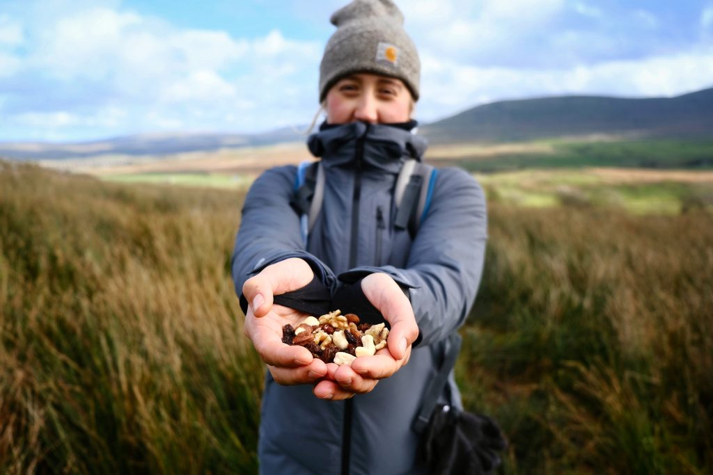 Girl holding vegan trail mix