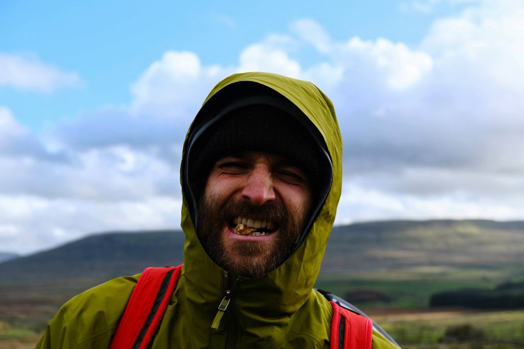 Man eating vegan trail mix
