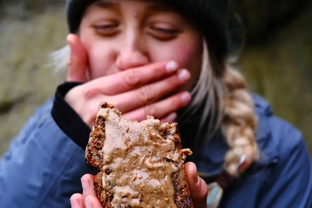 Girl eating best vegan banana bread