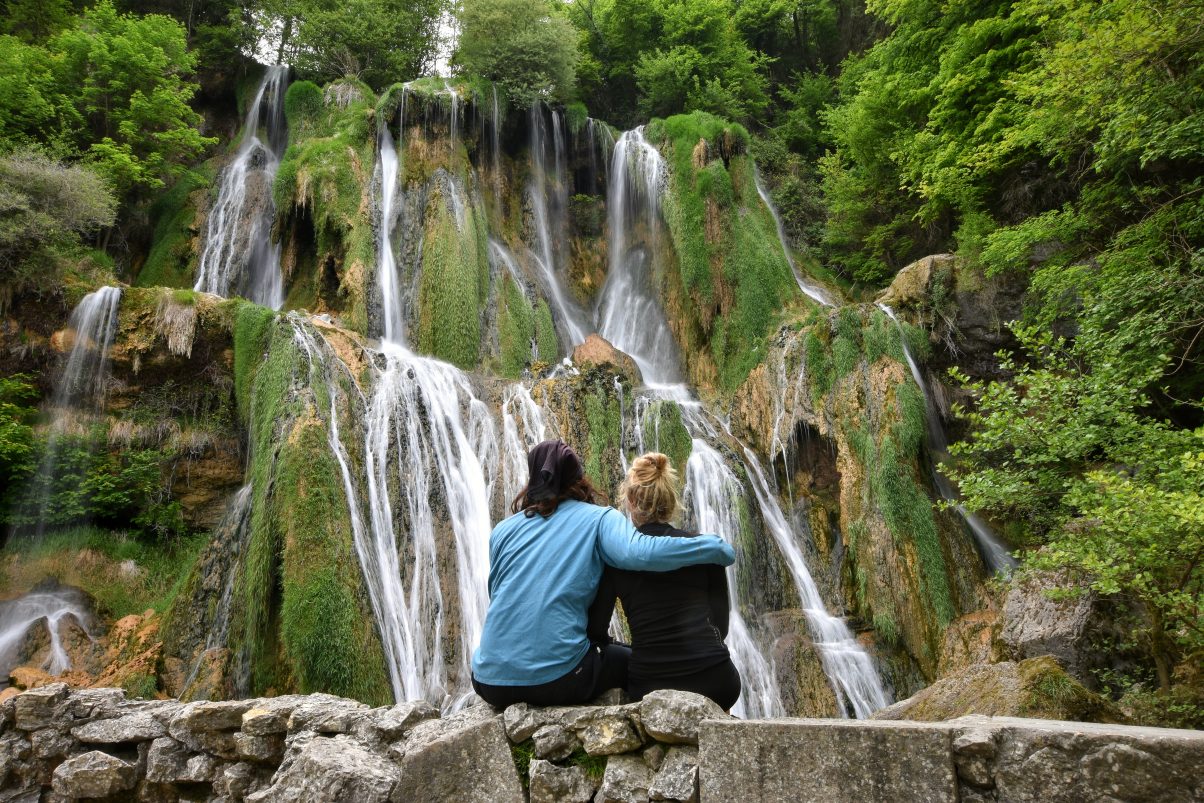 Couple in front of waterfalls
