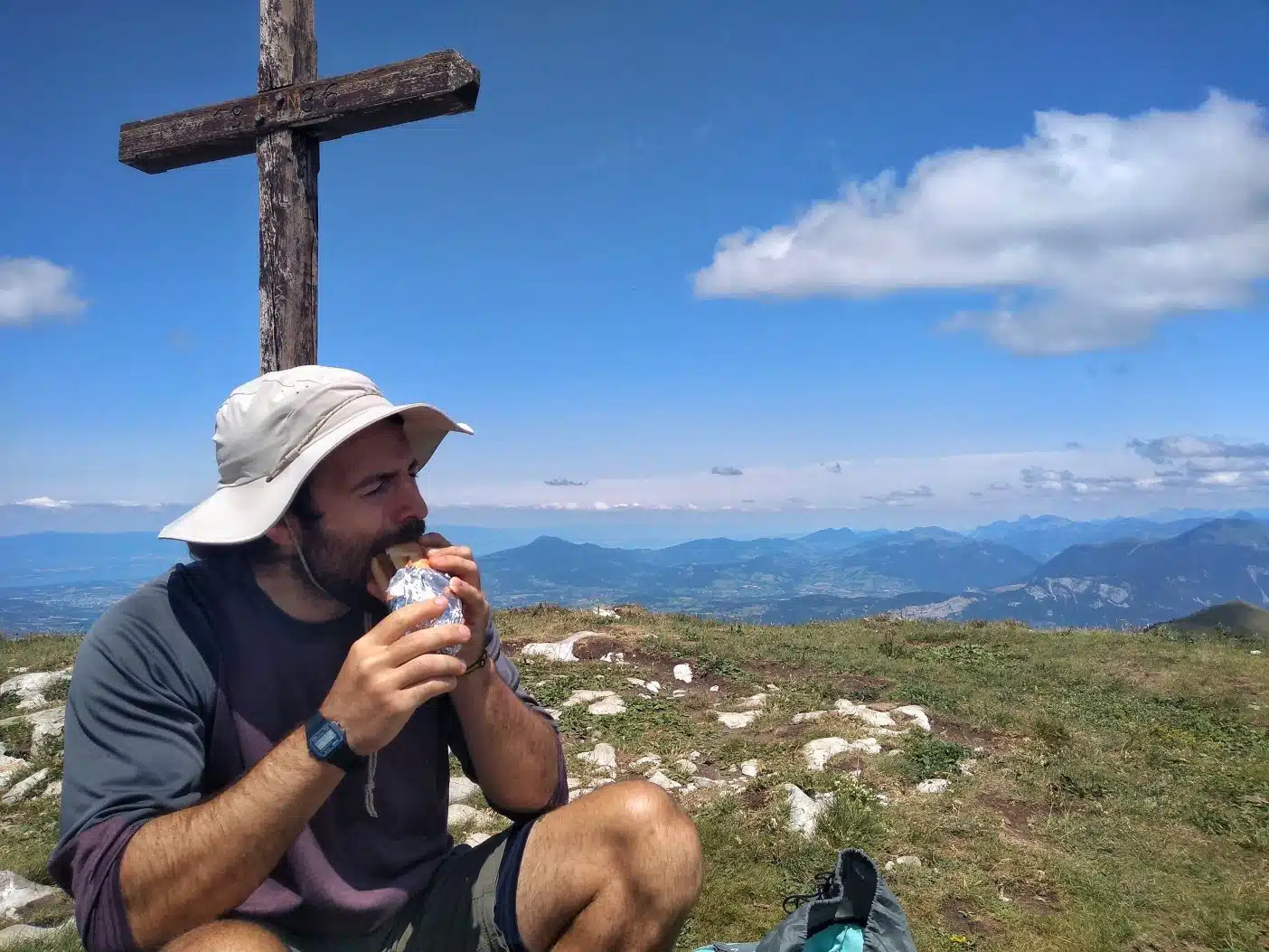 Man eating vegan day hike food 